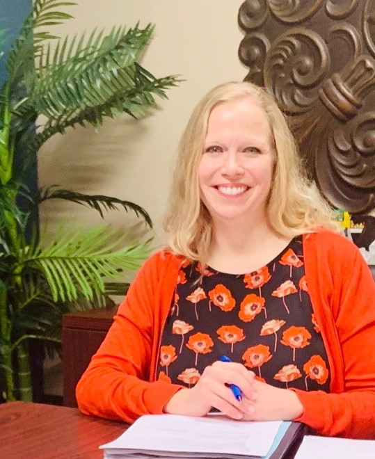 Adrienne DuBos at the closing table in the Plano Independence Title Office